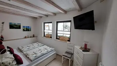 TV/Unterhaltungsangebot in der Unterkunft Ferienwohnung Aronia Garten