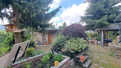 Ein Garten an der Unterkunft Ferienwohnung Aronia Garten