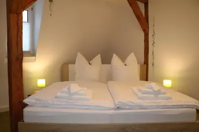 Ein Bett oder Betten in einem Zimmer der Unterkunft Fewo Friedrichsruh