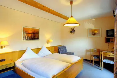 Ein Bett oder Betten in einem Zimmer der Unterkunft Steiner Wirt