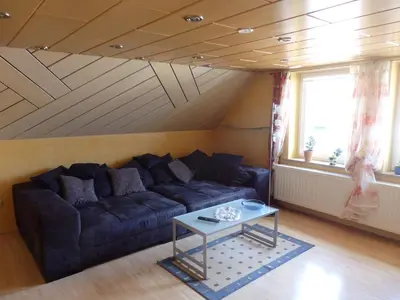 Ein Sitzbereich in der Unterkunft Wohnung Kronacher
