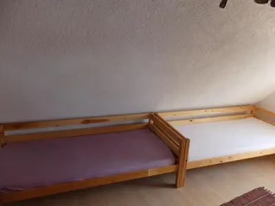 Ein Bett oder Betten in einem Zimmer der Unterkunft Wohnung Kronacher
