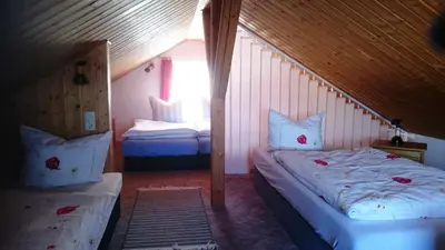 Ein Bett oder Betten in einem Zimmer der Unterkunft Ferienhaus Brigitte