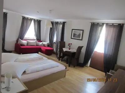 Ein Bett oder Betten in einem Zimmer der Unterkunft Pension-Puttlachtal