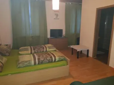 Ein Bett oder Betten in einem Zimmer der Unterkunft Pension-Puttlachtal