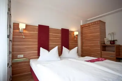 Ein Bett oder Betten in einem Zimmer der Unterkunft Landgasthof Am Sonnenhang