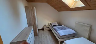 Ein Bett oder Betten in einem Zimmer der Unterkunft Haus Annemarie