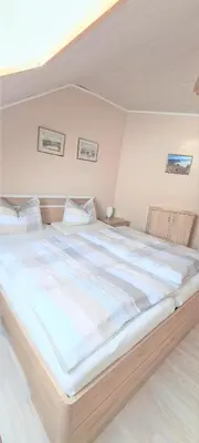 Ein Bett oder Betten in einem Zimmer der Unterkunft Haus Annemarie