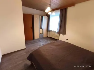 Ein Bett oder Betten in einem Zimmer der Unterkunft Pension Erika