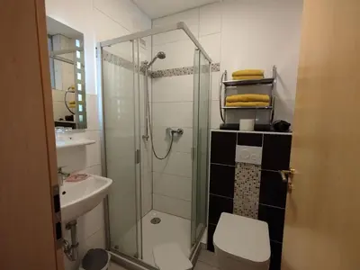 Ein Badezimmer in der Unterkunft Pension Erika