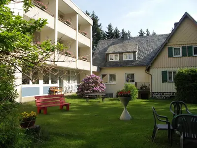 Ein Garten an der Unterkunft Pension Wölfel