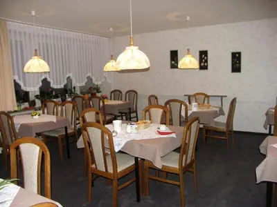 Ein Restaurant oder anderes Speiselokal in der Unterkunft Pension Wölfel