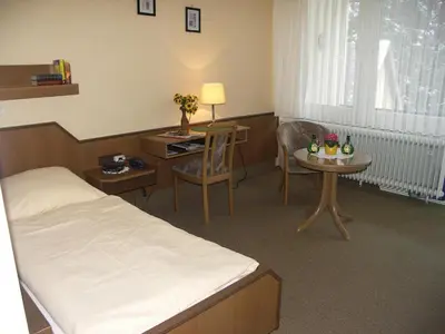 Ein Bett oder Betten in einem Zimmer der Unterkunft Pension Wölfel