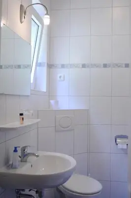 Ein Badezimmer in der Unterkunft Gasthof Hotel Schwarzes Roß