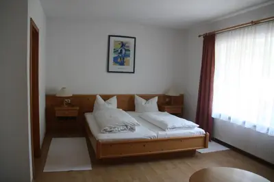Ein Bett oder Betten in einem Zimmer der Unterkunft Pension Fuchsbau