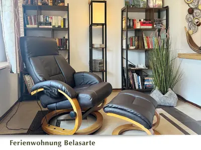Ein Sitzbereich in der Unterkunft Ferienwohnung Belasarte