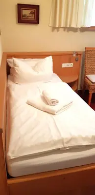 Ein Bett oder Betten in einem Zimmer der Unterkunft Villa Helvetia