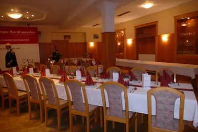 Ein Restaurant oder anderes Speiselokal in der Unterkunft Blaue Traube