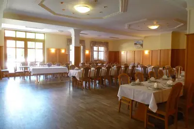 Ein Restaurant oder anderes Speiselokal in der Unterkunft Blaue Traube
