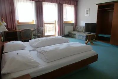 Ein Bett oder Betten in einem Zimmer der Unterkunft Blaue Traube
