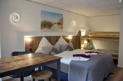 Ein Bett oder Betten in einem Zimmer der Unterkunft Waldpension Pfeiferhaus