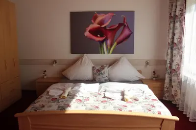 Ein Bett oder Betten in einem Zimmer der Unterkunft Waldpension Pfeiferhaus