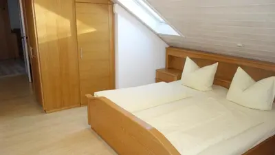 Ein Bett oder Betten in einem Zimmer der Unterkunft Fewo Breitenlesau