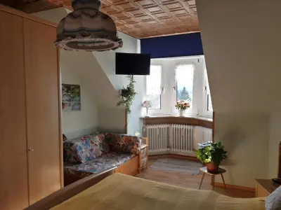 Ein Sitzbereich in der Unterkunft Ferienwohnung Schwalbennest