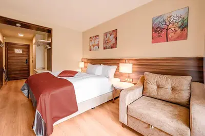 Ein Bett oder Betten in einem Zimmer der Unterkunft Sunday Schwarzbachtal Hideaway Resort