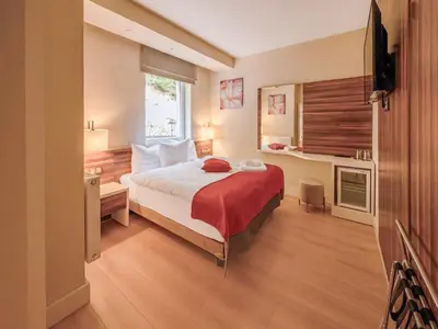 Ein Bett oder Betten in einem Zimmer der Unterkunft Sunday Schwarzbachtal Hideaway Resort