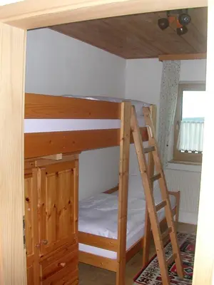 Ein Bett oder Betten in einem Zimmer der Unterkunft Gästehaus Fichtelgebirgsblick