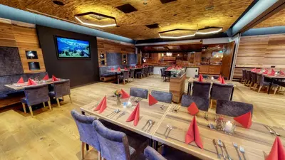 Ein Restaurant oder anderes Speiselokal in der Unterkunft Hotel Randsbergerhof