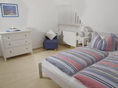 Ein Bett oder Betten in einem Zimmer der Unterkunft Ferienwohnung 