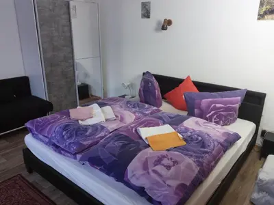 Ein Bett oder Betten in einem Zimmer der Unterkunft Am Mühlteich