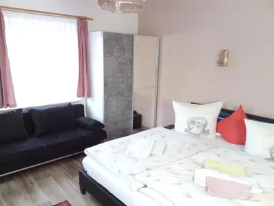 Ein Bett oder Betten in einem Zimmer der Unterkunft Am Mühlteich