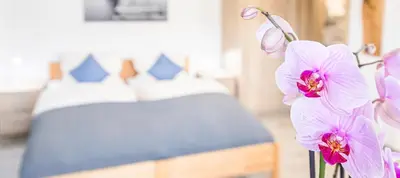 Ein Bett oder Betten in einem Zimmer der Unterkunft Weisses Rössl