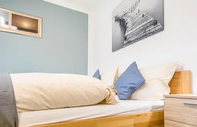 Ein Bett oder Betten in einem Zimmer der Unterkunft Weisses Rössl
