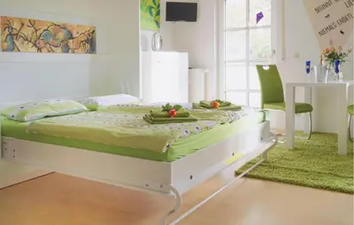 Ein Bett oder Betten in einem Zimmer der Unterkunft Beautiful Apartment In Heinersreuth