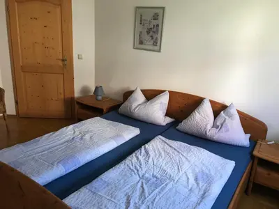 Ein Bett oder Betten in einem Zimmer der Unterkunft Ferienwohnung Scherr