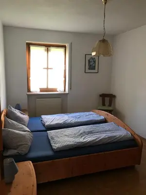 Ein Bett oder Betten in einem Zimmer der Unterkunft Ferienwohnung Scherr