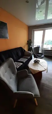 Ein Sitzbereich in der Unterkunft Gästehaus am Steinwald