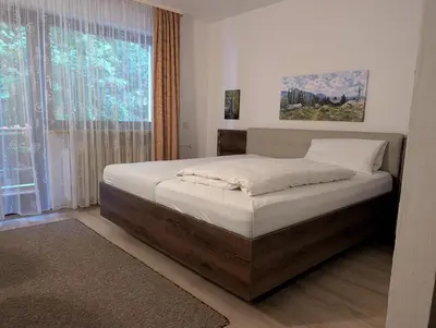 Ein Bett oder Betten in einem Zimmer der Unterkunft Hotel Pension Blüchersruh