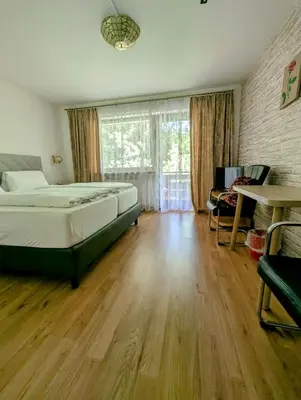 Ein Bett oder Betten in einem Zimmer der Unterkunft Hotel Pension Blüchersruh