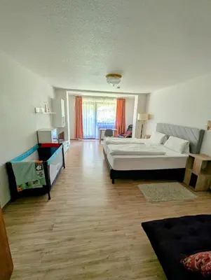 Ein Bett oder Betten in einem Zimmer der Unterkunft Hotel Pension Blüchersruh