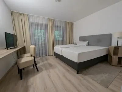 Ein Bett oder Betten in einem Zimmer der Unterkunft Hotel Pension Blüchersruh