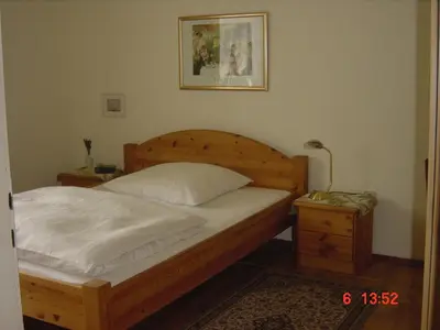 Ein Bett oder Betten in einem Zimmer der Unterkunft Hotel Schmidt