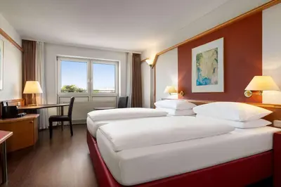 Ein Bett oder Betten in einem Zimmer der Unterkunft Amedia Weiden, Trademark Collection by Wyndham