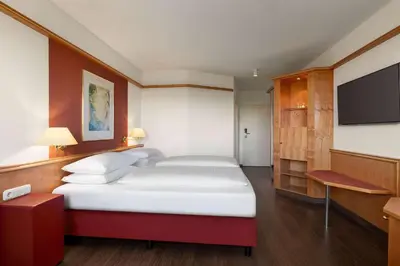 Ein Bett oder Betten in einem Zimmer der Unterkunft Amedia Weiden, Trademark Collection by Wyndham