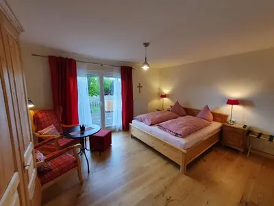 Ein Bett oder Betten in einem Zimmer der Unterkunft Pension am Kirschgarten