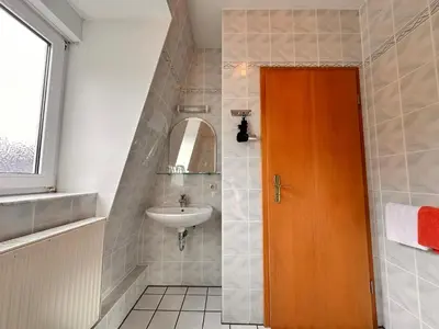 Ein Badezimmer in der Unterkunft Pension zum Löwen, Parkplatz, Wlan, Zentral